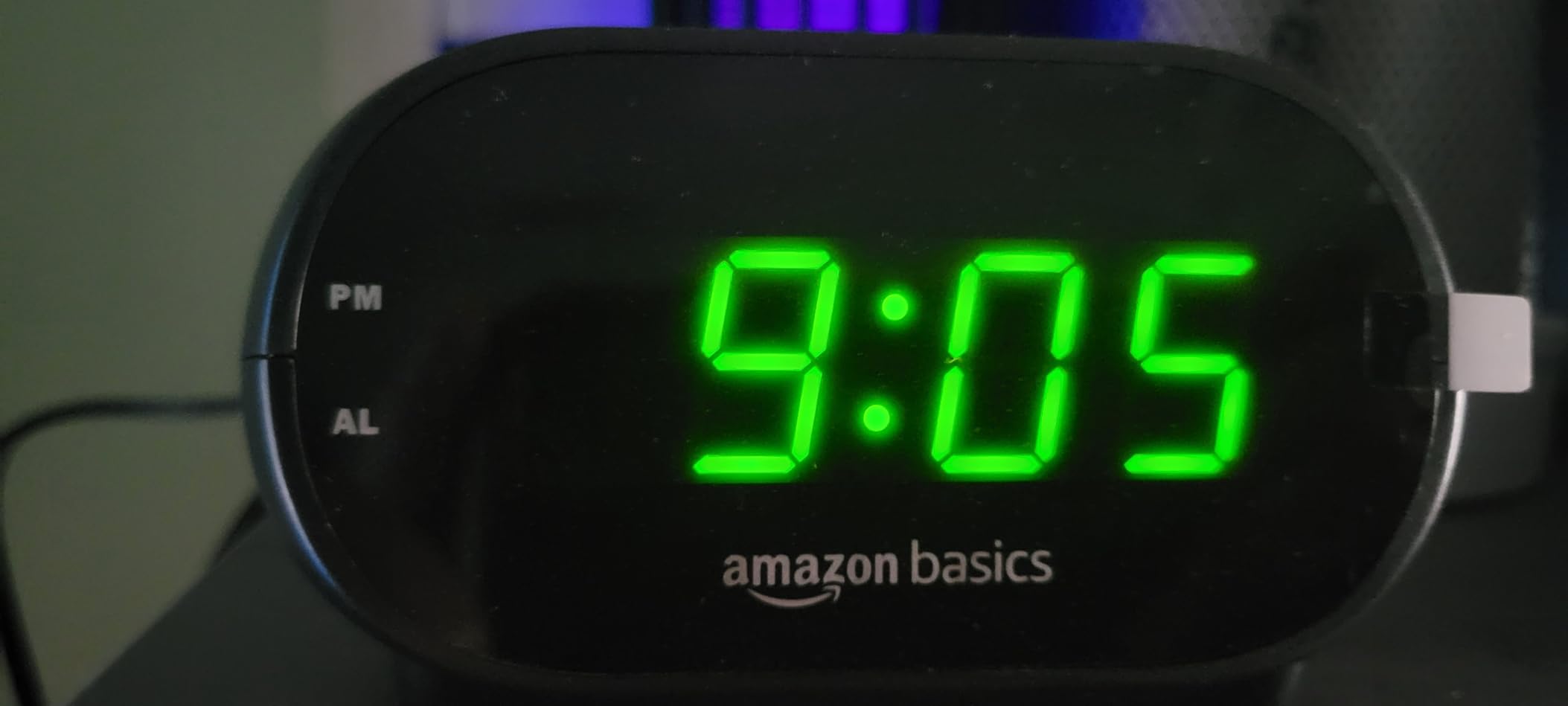 Amazon Basics Small Digital Oval Alarm Clock with LED Display, Nightlight, Snooze Function & Battery Backup, Black, 4.5 x 3.5 x 2.4 Inches customer photo 2