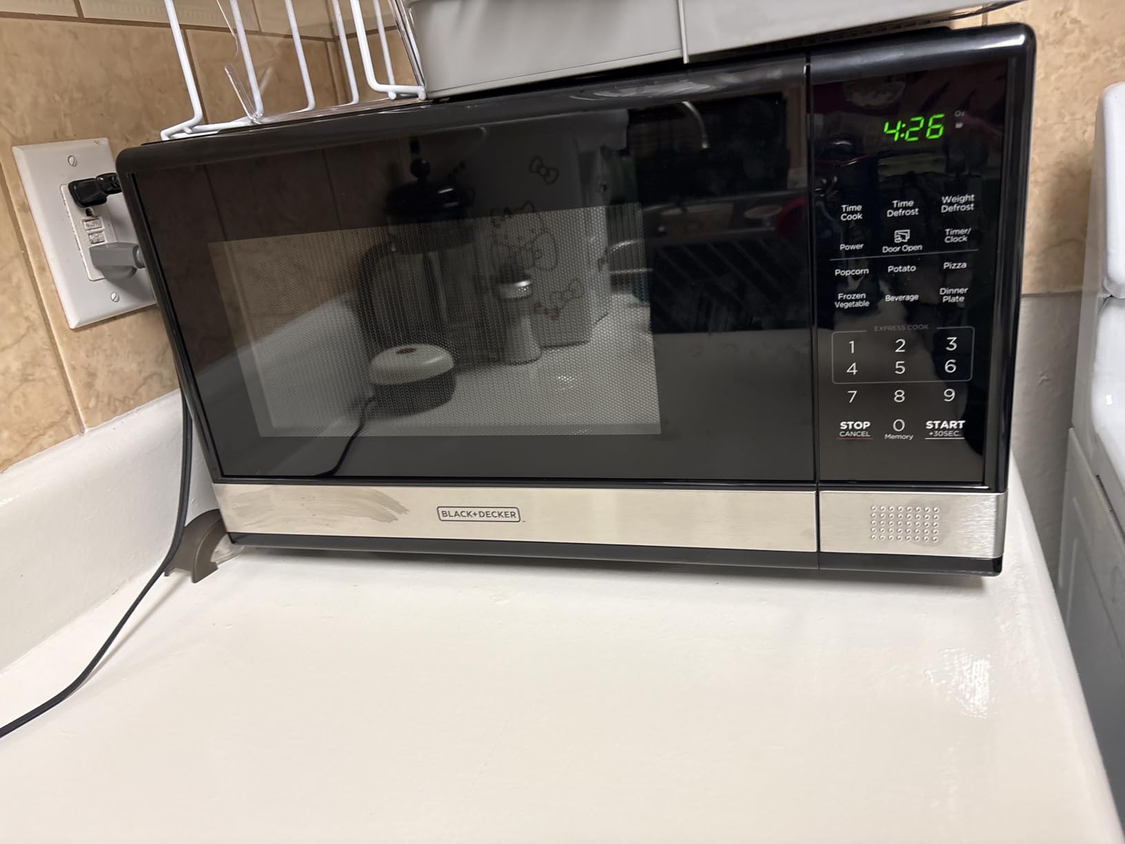 BLACK+DECKER EM720CB7 Digital Microwave Oven with Turntable Push-Button Door, Child Safety Lock, 700W, Stainless Steel, 0.7 Cu.ft customer photo 2