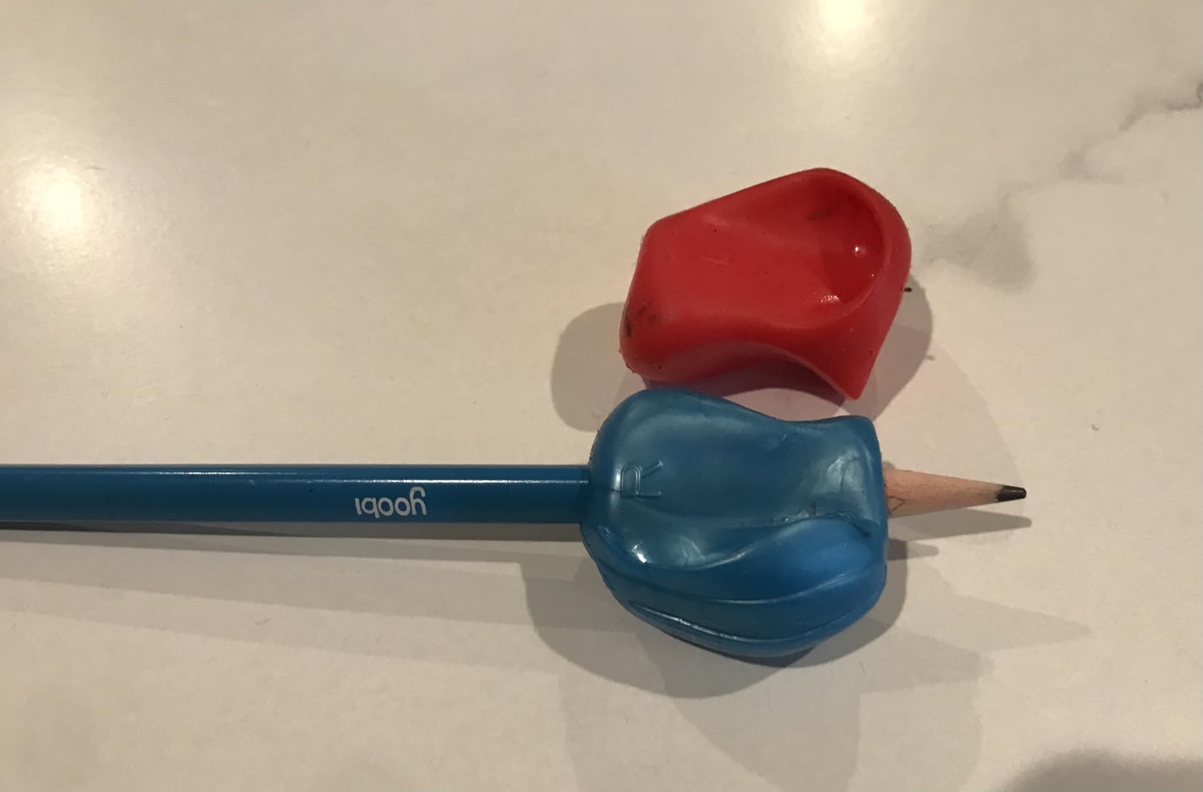 The Pencil Grip 3-Step Training Kit - Crossover Grip, Pinch Grip & Standard Pencil Grip Ergonomic Writing Aids for Kids, Students, Fine Motor Development, Assorted Colors, Pack of 3 Grips (1 per Type) customer photo 1