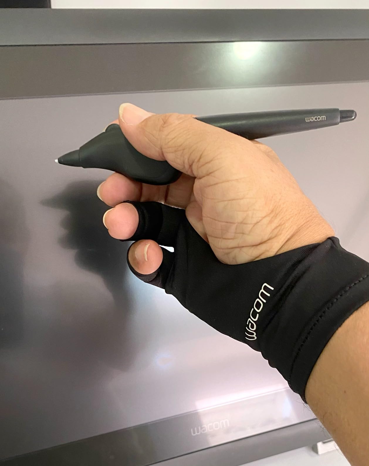 Wacom Artist Drawing Glove, One-Size, 1 Count | 1 pack glove features exposed fingertip design, allows creator to access touchscreen and type with ease on a keyboard customer photo 2