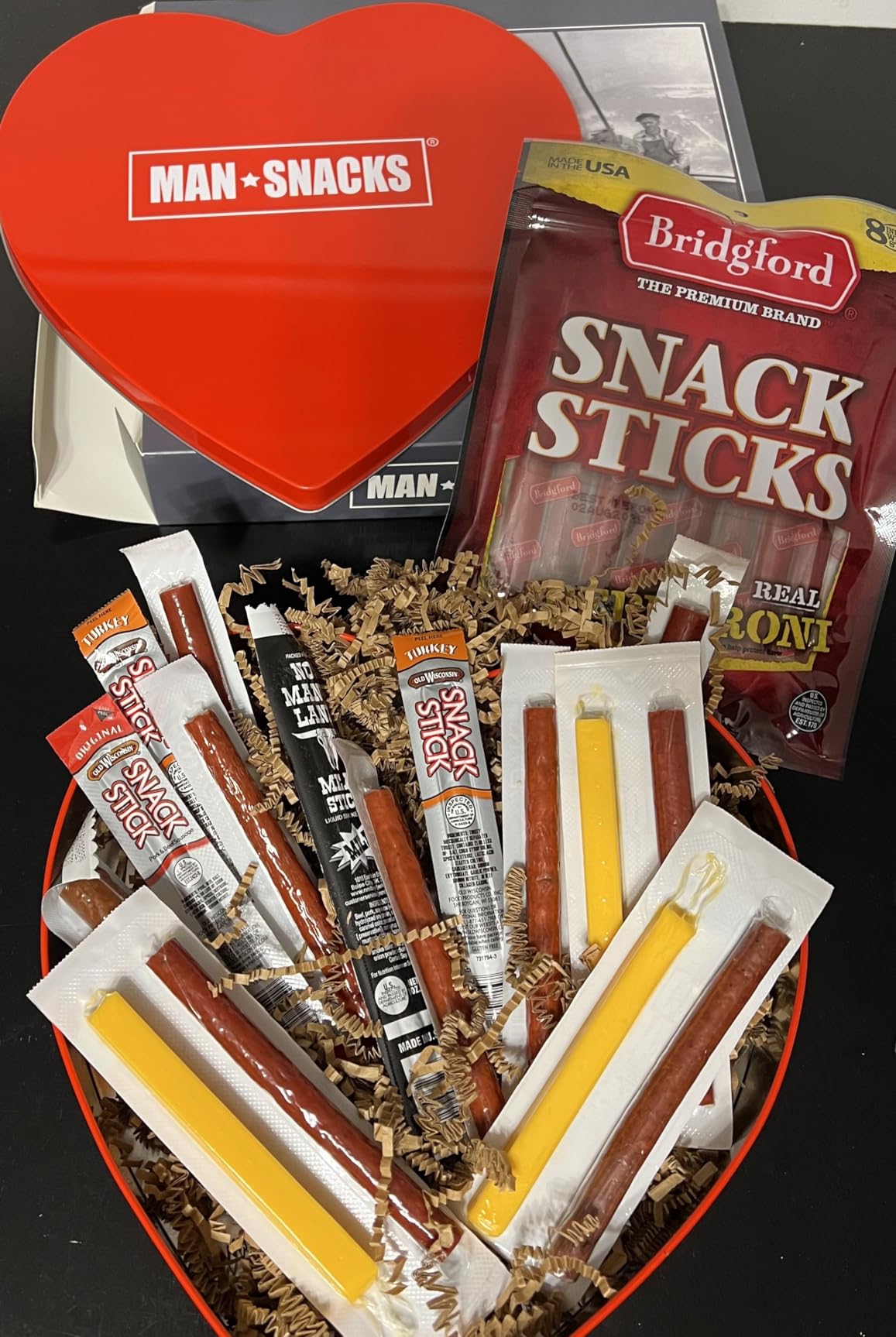 ManSnacks Deluxe Jerky & Nuts Gift Basket for Men - 28 pc - Large Variety of Beef Jerky Sticks, Pepperoni Sticks, Cheese Sticks, Almonds, Peanuts & Pistachios, in a Manly Gift Bag customer photo 1