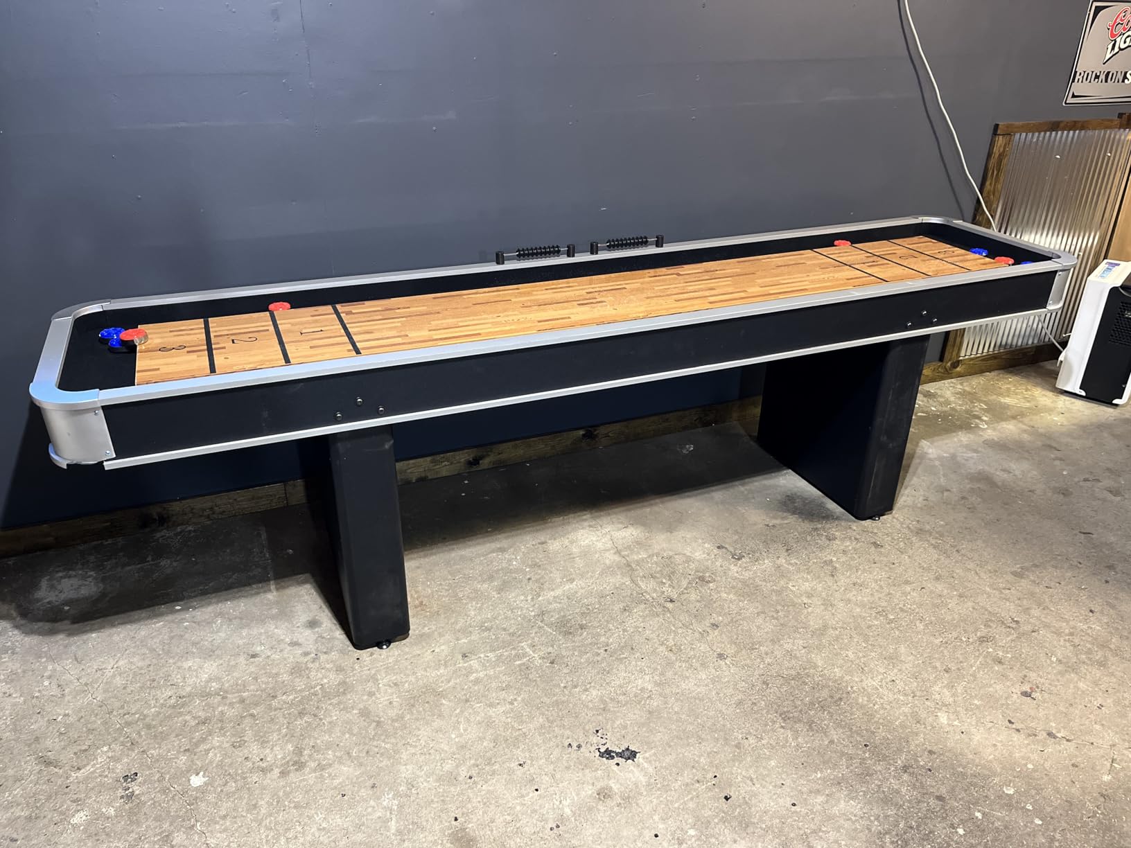 Atomic 9’ LED Shuffleboard Tables with Poly-Coated Playing Surface for Smooth, Fast Puck Action and Pedestal Legs with Levelers for Optimum Stability and Level Play customer photo 1