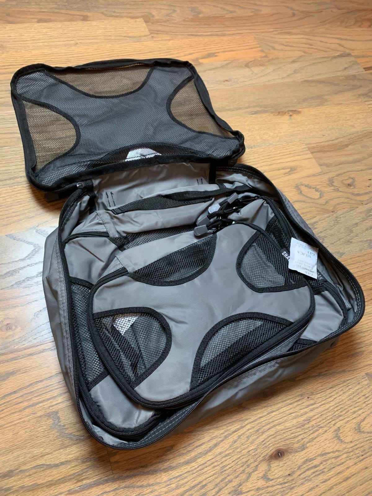 Shacke 5 Set Packing Cubes for Travel with Laundry Bag (Pure Black) | Suitcase Organizer Bags Set: 4 Water-Resistant Luggage Cubes, XL to Small, + Laundry Bag for Carry-On or Checked customer photo 1