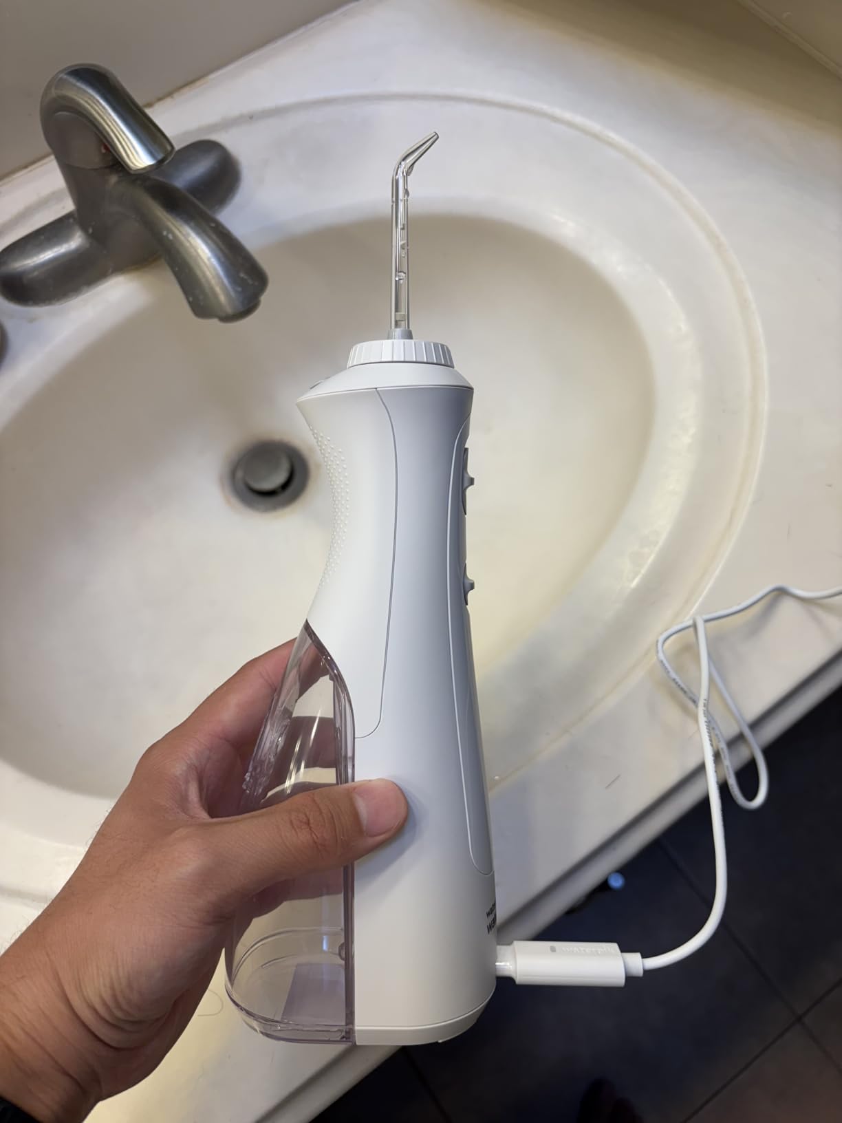 Waterpik Cordless Pearl Portable Water Flosser, Rechargeable, White | 2 Settings, 4 Tips, for Daily Gum Health & Cleaning Teeth, Dental Braces, Implants, ADA Accepted, WF-13 customer photo 1