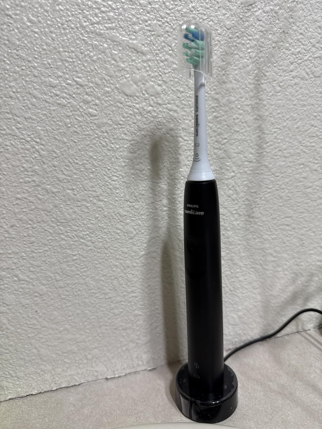 Philips Sonicare 4100 Rechargeable Electric Toothbrush, 1 Brush Head, Black | 700% More Plaque Removal, Pressure Sensor, 2 Brush Settings, 2-Minute Guided Timer, 14-Day Battery, HX3681/24 customer photo 1