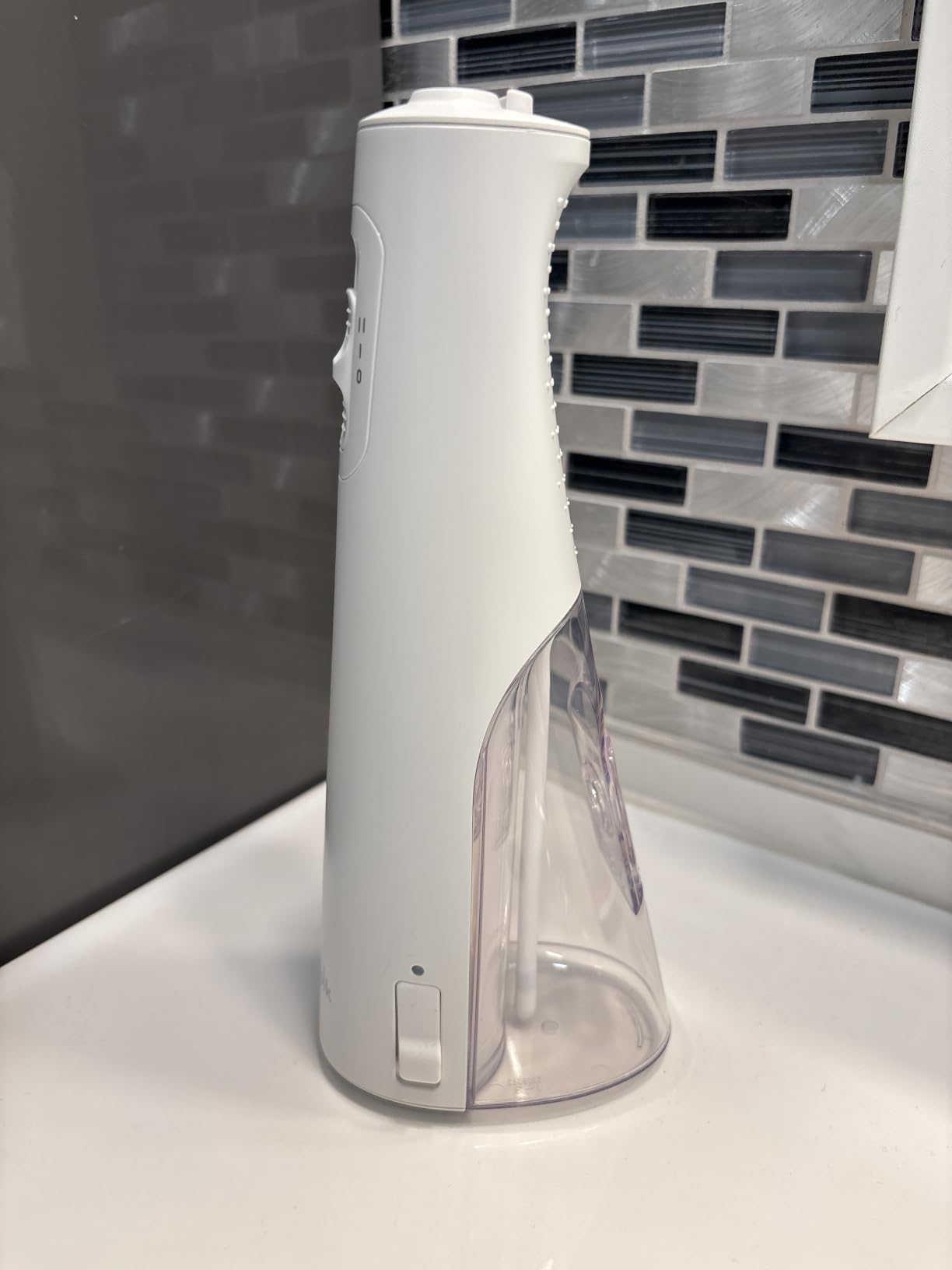 Waterpik Cordless Pulse 3100 Portable Water Flosser, Rechargeable, White | 2 Settings, 1 Precision Tip & 1 Tongue Cleaner Tip for Fresh Breath, Travel, Shower Use, ADA Accepted, WF-20 Amazon Exclusive customer photo 2