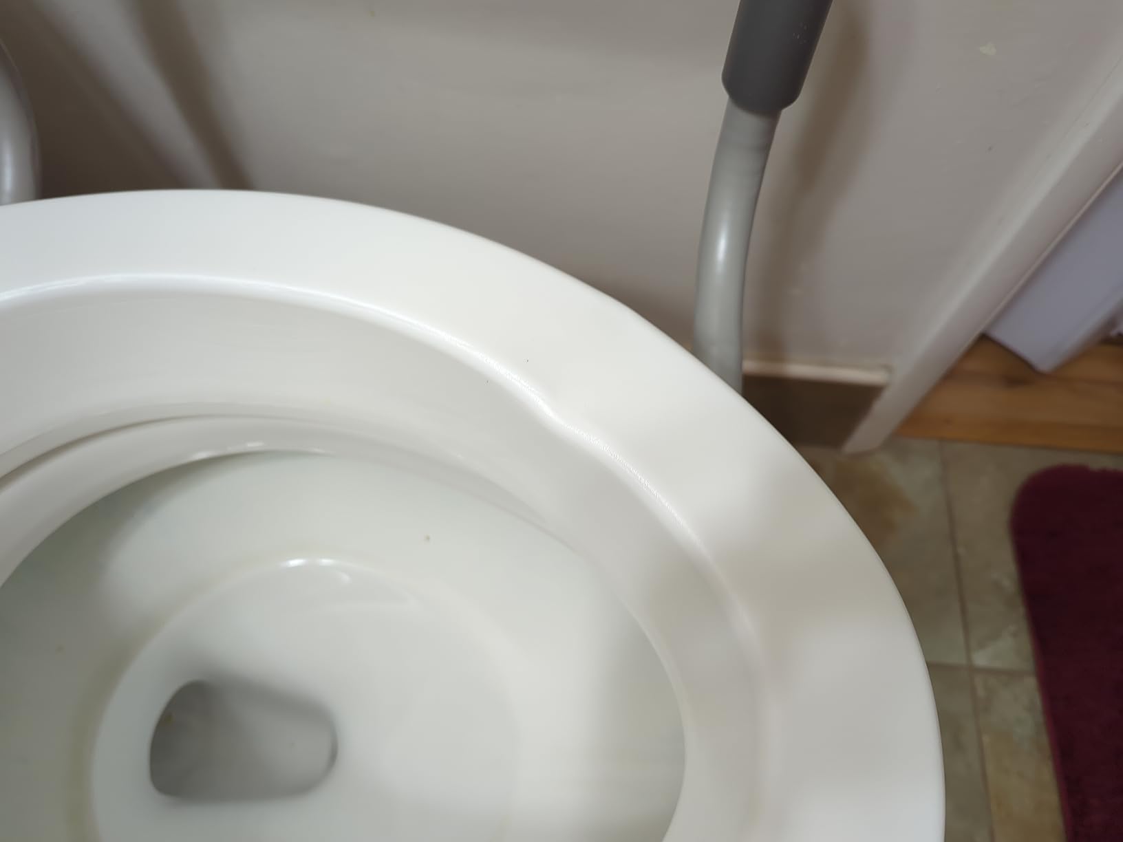Carex 3.5 Inch Raised Toilet Seat with Arms, Elongated Toilet Seat Riser, Up to 250 lbs Capacity, Elevating & Raising Seat for Elderly & Handicap, Universal, Slip-Resistant with Padded Handles, White customer photo 2